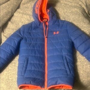 Under Armour Blue Jacket with Orange Trim new w/o tags never worn.